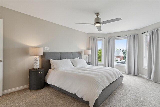 46746 Merion Cir, Northville, MI 48168 - bedroom with light colored carpet and ceiling fan
