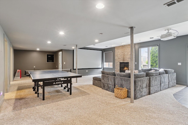 46746 Merion Cir, Northville, MI 48168 - recreation room featuring carpet flooring, recessed lighting, and a fireplace