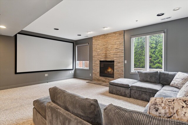 46746 Merion Cir, Northville, MI 48168 - home theater featuring carpet flooring, a stone fireplace, and recessed lighting