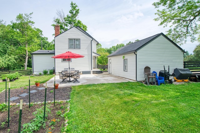 4151 Dexter Ann Arbor Rd, Ann Arbor, MI 48103 - rear view of property featuring a patio area and a chimney