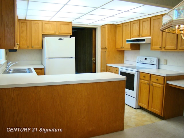 4215 S Wayside Dr, Saginaw, MI 48603 - kitchen with white appliances, extractor fan, light countertops, a peninsula, and brown cabinetry