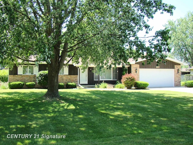 4215 S Wayside Dr, Saginaw, MI 48603 - obstructed view of property featuring brick siding, board and batten siding, and a front lawn