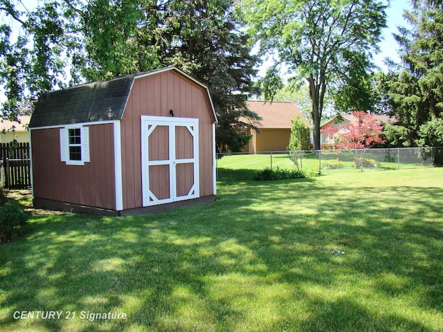 4215 S Wayside Dr, Saginaw, MI 48603 - view of shed featuring a fenced backyard