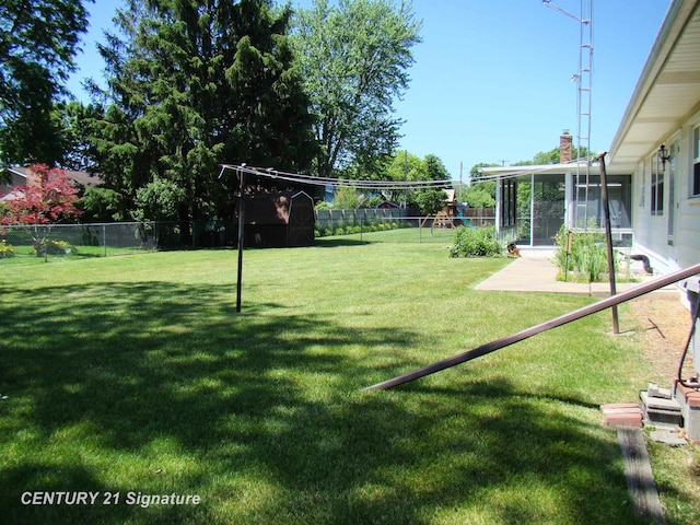 4215 S Wayside Dr, Saginaw, MI 48603 - view of yard with a sunroom