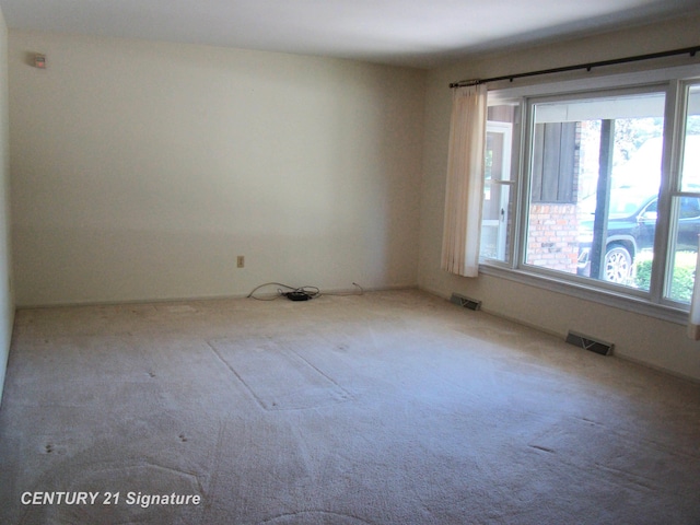 4215 S Wayside Dr, Saginaw, MI 48603 - spare room featuring carpet