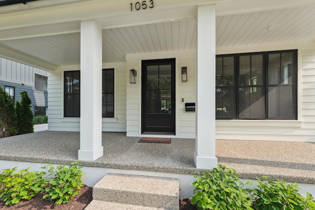 1053 Canterbury St, Birmingham, MI 48009 - view of exterior entry featuring covered porch