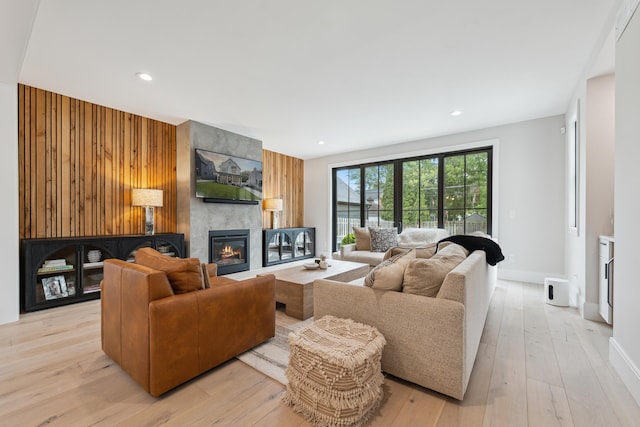 1053 Canterbury St, Birmingham, MI 48009 - living area featuring a large fireplace, light wood-style floors, and recessed lighting