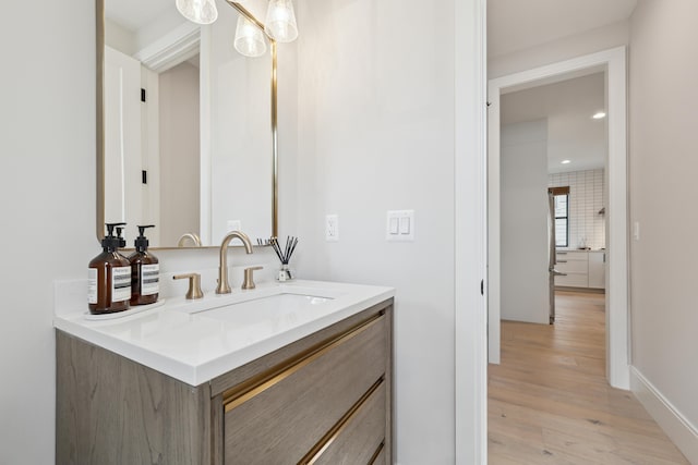 1053 Canterbury St, Birmingham, MI 48009 - bathroom featuring vanity, wood finished floors, and recessed lighting