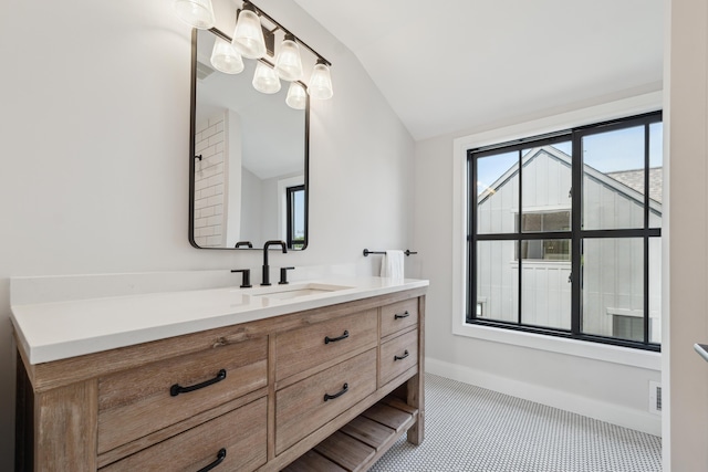 1053 Canterbury St, Birmingham, MI 48009 - bathroom with vanity and vaulted ceiling