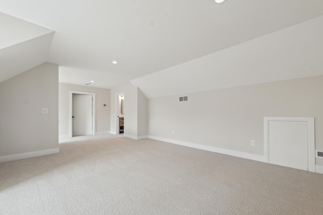 1053 Canterbury St, Birmingham, MI 48009 - bonus room featuring vaulted ceiling, light colored carpet, and recessed lighting