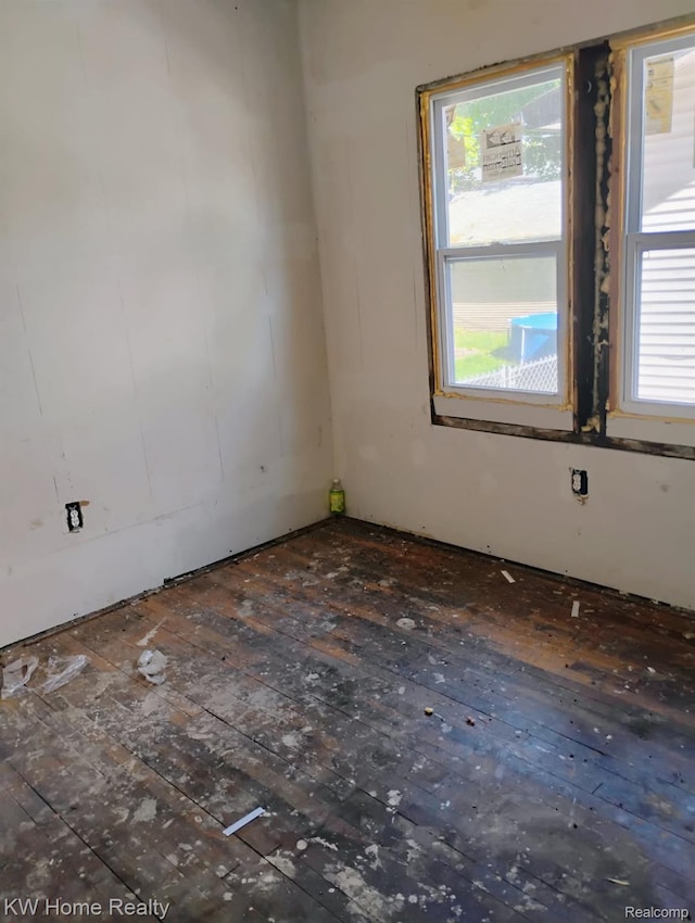 12749 Washburn St, Detroit, MI 48238 - spare room featuring hardwood / wood-style flooring and plenty of natural light