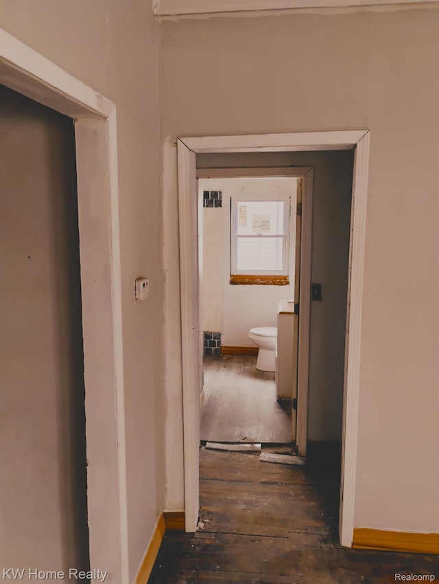 12749 Washburn St, Detroit, MI 48238 - hallway featuring wood-type flooring and baseboards