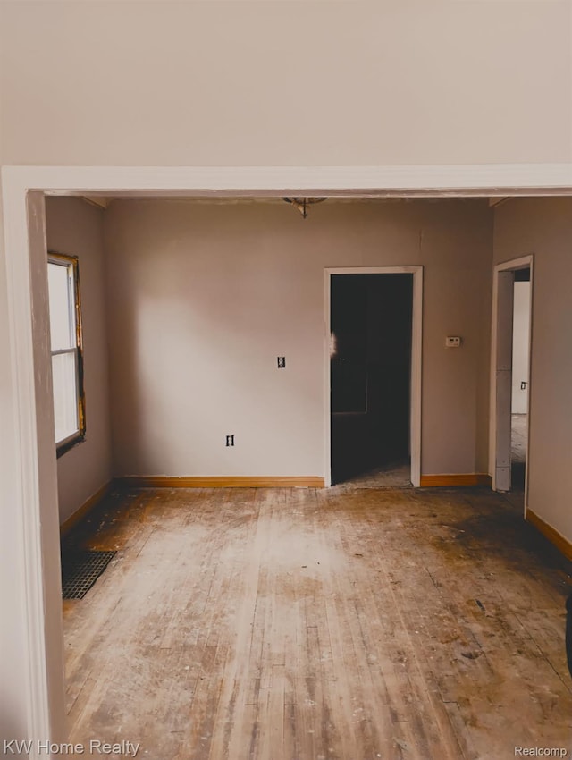 12749 Washburn St, Detroit, MI 48238 - spare room featuring wood-type flooring and baseboards