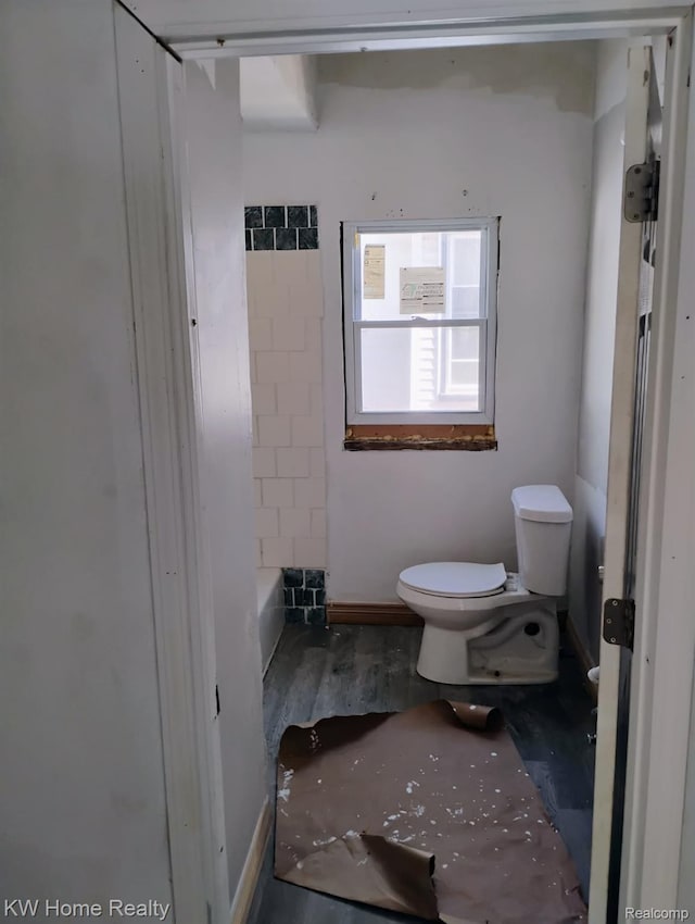 12749 Washburn St, Detroit, MI 48238 - bathroom with a bath and wood finished floors