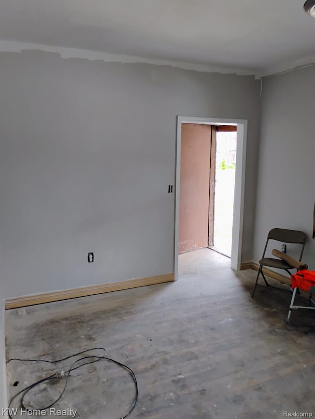 12749 Washburn St, Detroit, MI 48238 - spare room with concrete flooring and baseboards