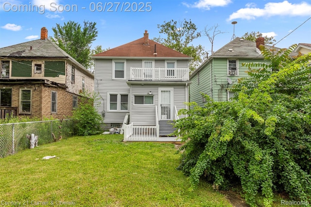 3917 Bewick St, Detroit, MI 48214 - rear view of house featuring a balcony