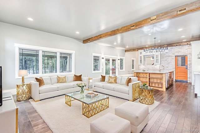 2685 Fry Rd, Highland, MI 48357 - living room with beam ceiling, dark wood-type flooring, and recessed lighting