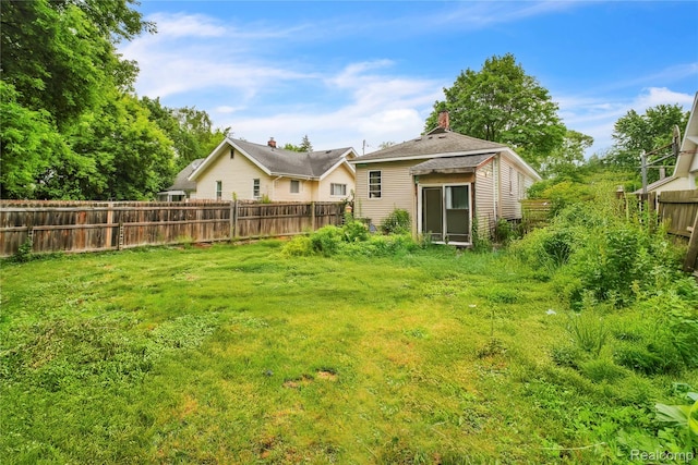 2211 Avon St, Saginaw, MI 48602 - fenced backyard with a shed