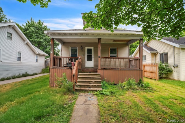 2211 Avon St, Saginaw, MI 48602 - bungalow-style home with a porch