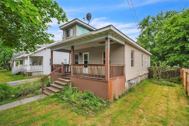 2211 Avon St, Saginaw, MI 48602 - view of front of property with a porch