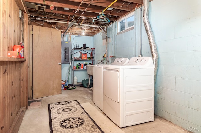 239 Heyn St, Saginaw, MI 48602 - laundry area with electric panel and separate washer and dryer