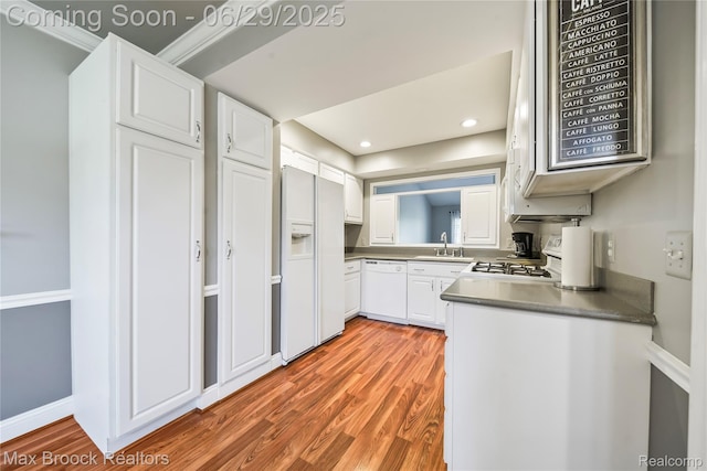 15653 Heather Ridge Trl, Clinton Township, MI 48038 - kitchen with white appliances, white cabinets, light wood finished floors, and recessed lighting