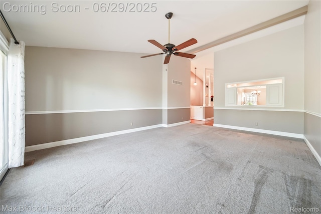 15653 Heather Ridge Trl, Clinton Township, MI 48038 - carpeted empty room featuring vaulted ceiling, ceiling fan, and a chandelier