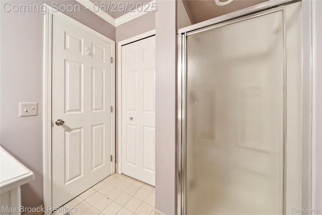 15653 Heather Ridge Trl, Clinton Township, MI 48038 - full bath with a shower stall, ornamental molding, and tile patterned floors