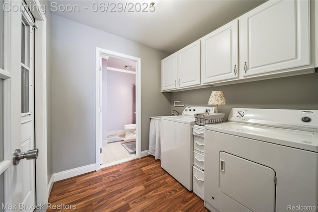 15653 Heather Ridge Trl, Clinton Township, MI 48038 - washroom with independent washer and dryer, cabinet space, and dark wood-type flooring