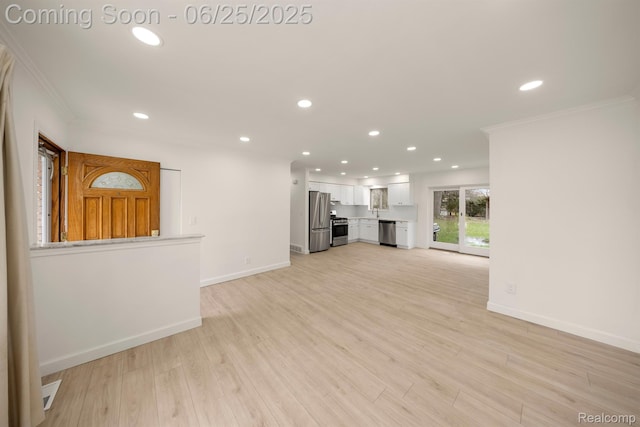 22323 Gordon Rd, Saint Clair Shores, MI 48081 - unfurnished living room featuring ornamental molding, recessed lighting, and light wood-type flooring