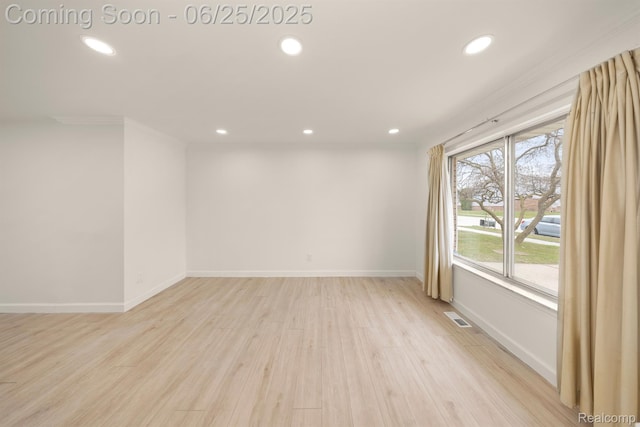 22323 Gordon Rd, Saint Clair Shores, MI 48081 - spare room featuring recessed lighting, light wood-style floors, and ornamental molding