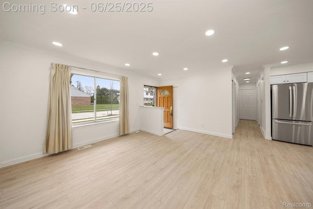 22323 Gordon Rd, Saint Clair Shores, MI 48081 - unfurnished living room with recessed lighting, light wood-type flooring, and ornamental molding