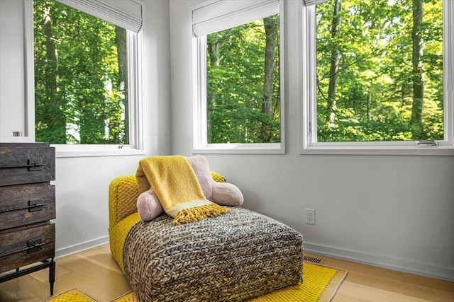 9182 Hemlock Ln, Bridgman, MI 49106 - sitting room with healthy amount of natural light and wood finished floors