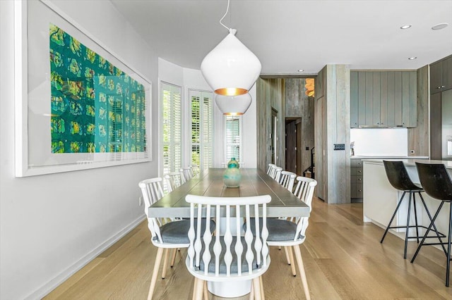 9182 Hemlock Ln, Bridgman, MI 49106 - dining room featuring light wood-style flooring and recessed lighting