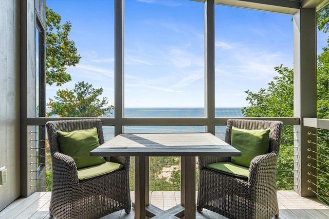 9182 Hemlock Ln, Bridgman, MI 49106 - sunroom featuring a water view and outdoor dining space