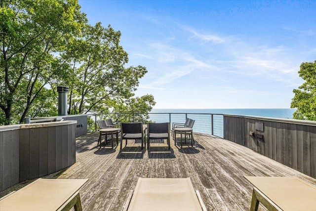 9182 Hemlock Ln, Bridgman, MI 49106 - deck with a water view and outdoor dining space