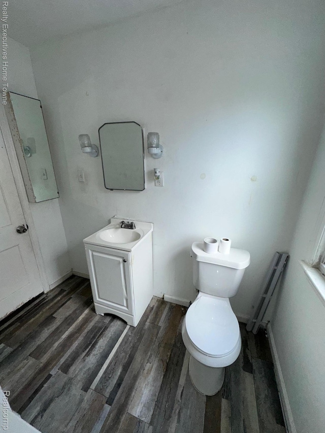 19738 Westphalia St, Detroit, MI 48205 - half bathroom with wood finished floors and vanity
