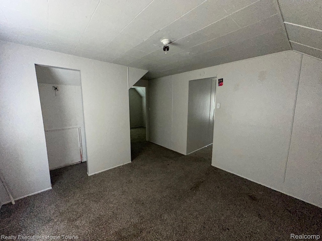 19738 Westphalia St, Detroit, MI 48205 - unfurnished bedroom featuring dark colored carpet