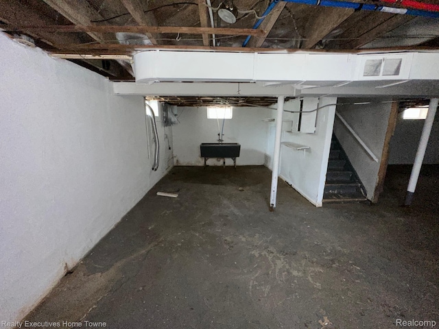 19738 Westphalia St, Detroit, MI 48205 - basement featuring a sink and stairs