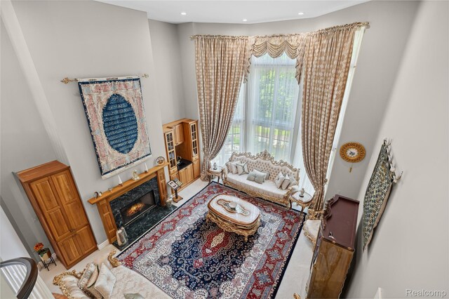 8356 Misty Mdws, Grand Blanc, MI 48439 - living room featuring a high ceiling and a premium fireplace
