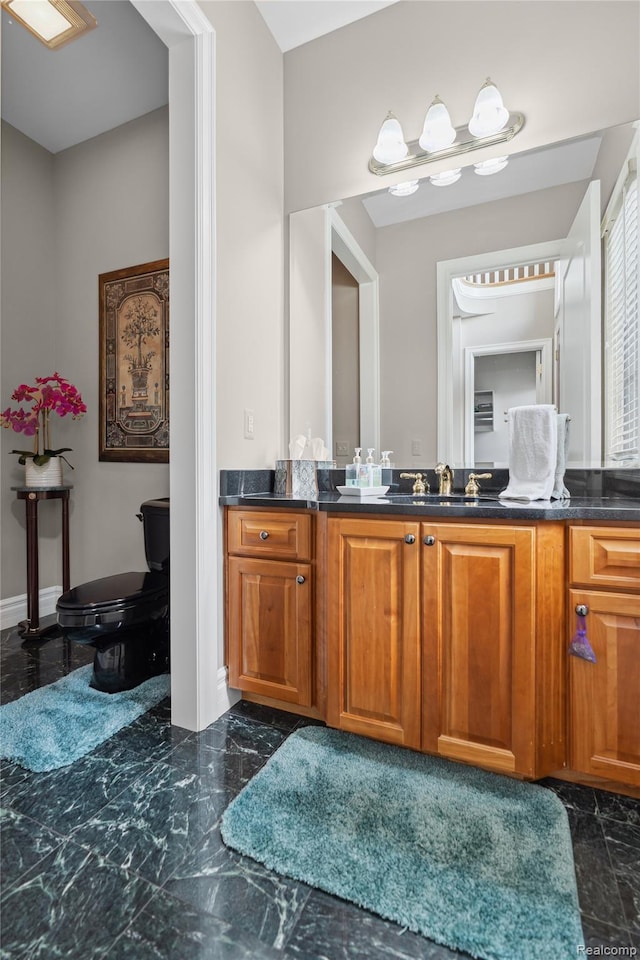 8356 Misty Mdws, Grand Blanc, MI 48439 - bathroom featuring vanity and marble tiled floors