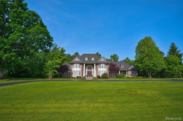 8356 Misty Mdws, Grand Blanc, MI 48439 - greek revival inspired property featuring a front yard