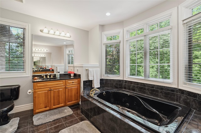 8356 Misty Mdws, Grand Blanc, MI 48439 - full bathroom featuring a tub with jets, vanity, and tile patterned floors