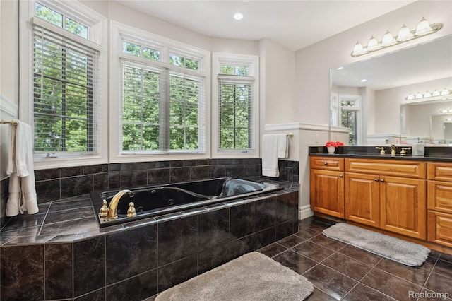 8356 Misty Mdws, Grand Blanc, MI 48439 - bathroom featuring vanity, a jetted tub, tile patterned floors, and recessed lighting