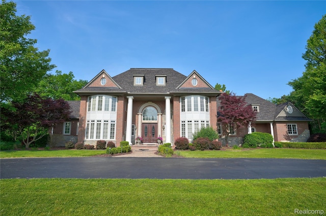 8356 Misty Mdws, Grand Blanc, MI 48439 - view of front of house featuring a front yard and french doors