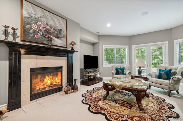 8356 Misty Mdws, Grand Blanc, MI 48439 - living area with a fireplace, plenty of natural light, carpet flooring, recessed lighting, and french doors