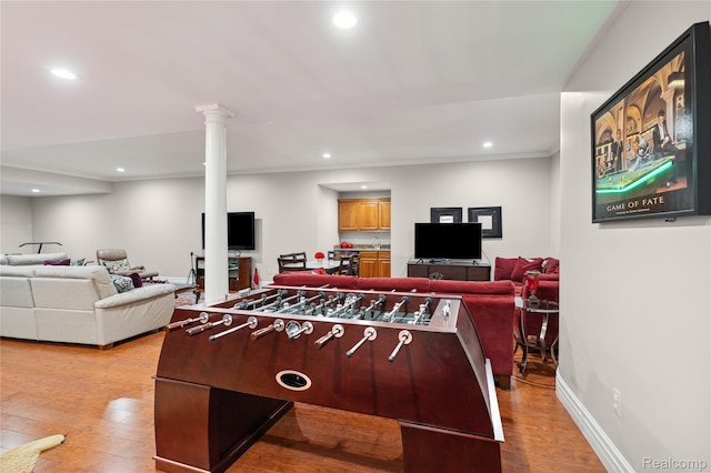 8356 Misty Mdws, Grand Blanc, MI 48439 - game room with recessed lighting, light wood-style floors, and decorative columns