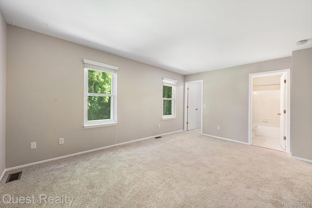 28041 Gettysburg St, Farmington, MI 48331 - unfurnished bedroom featuring carpet and connected bathroom
