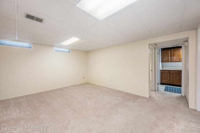 28041 Gettysburg St, Farmington, MI 48331 - below grade area featuring light colored carpet and a drop ceiling