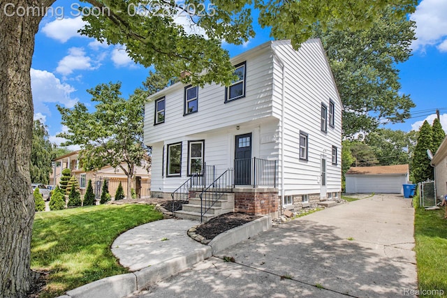 1812 Kinmore St, Dearborn Heights, MI 48127 - colonial-style house with a front yard and an outdoor structure